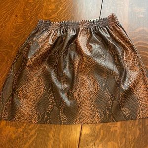 Snake skin print mini skirt rust and brown coloured.